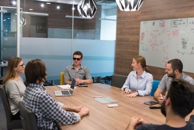 Business team on meeting, Modern Workplace, Financial Services | DXC Technology